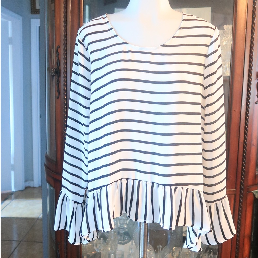 ANA Black & White stripe woman’s top.